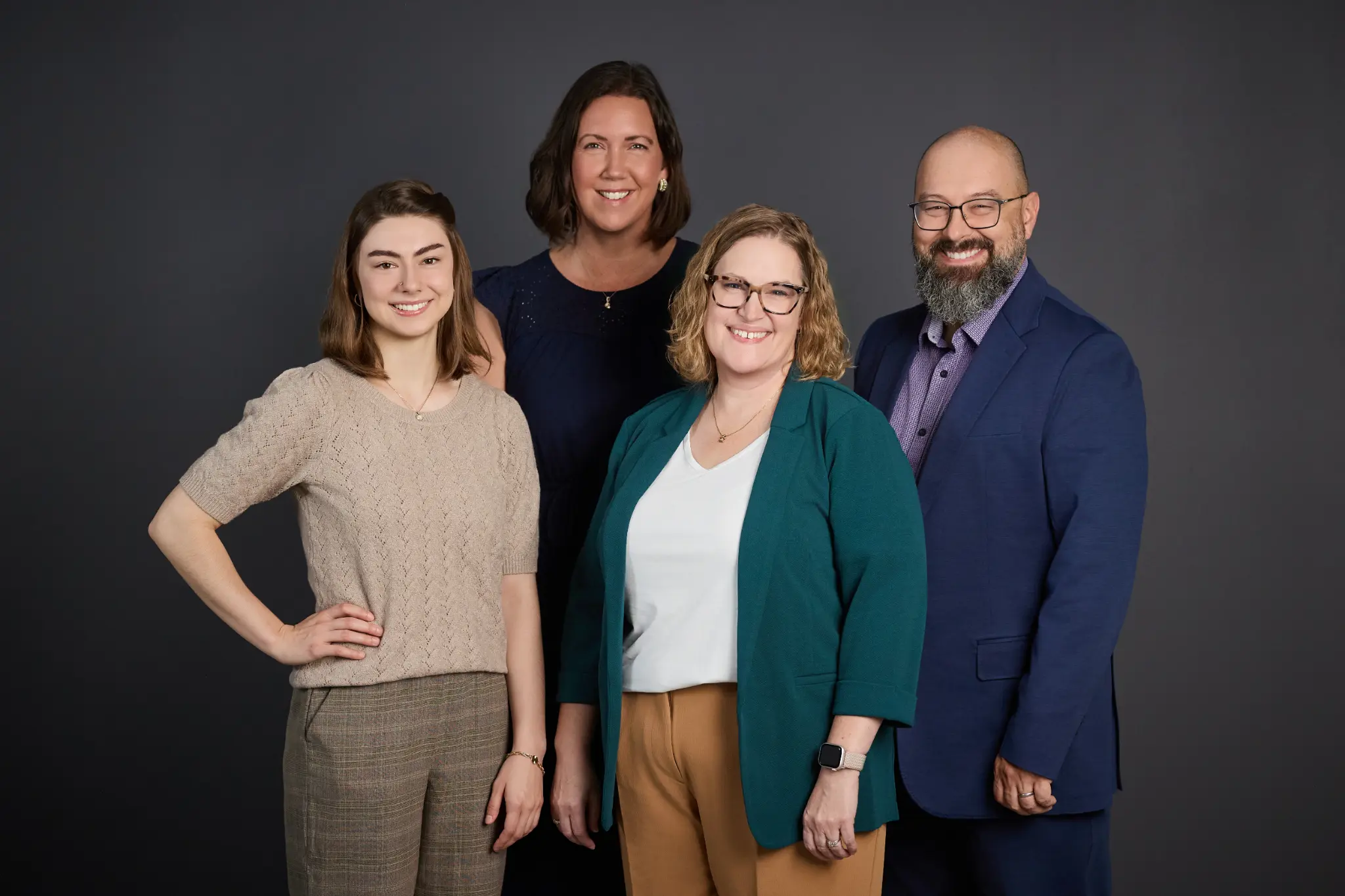 Jennifer Schmidt, Allison Matson, Stephanie Matson, and Scott Matson of Magnify Real Estate Group